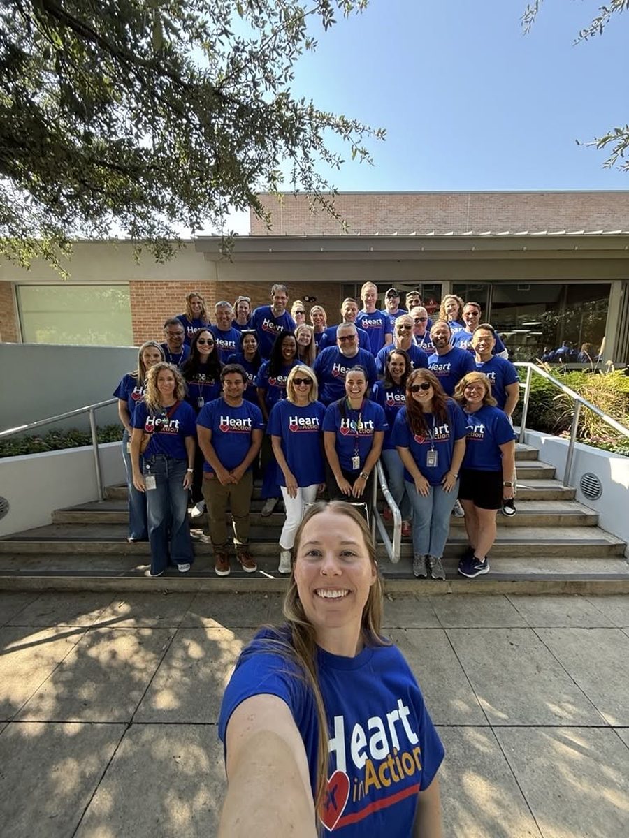 VNA staff and volunteers gathered outside in Heart in Action shirts